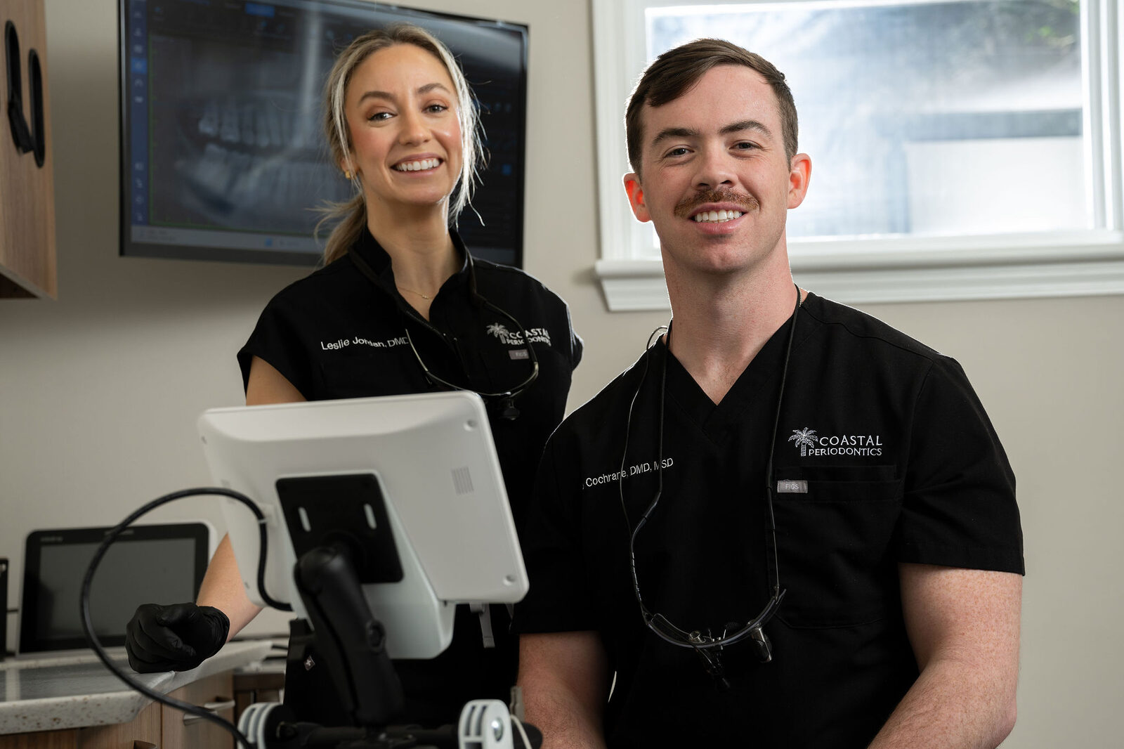 Dr. Cochrane and Dr. Jordan at Coastal Periodontics